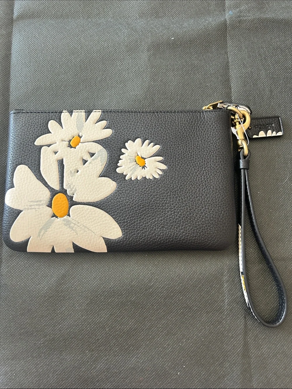 Coach Black Wristlet Clutch with White Daisy Motif